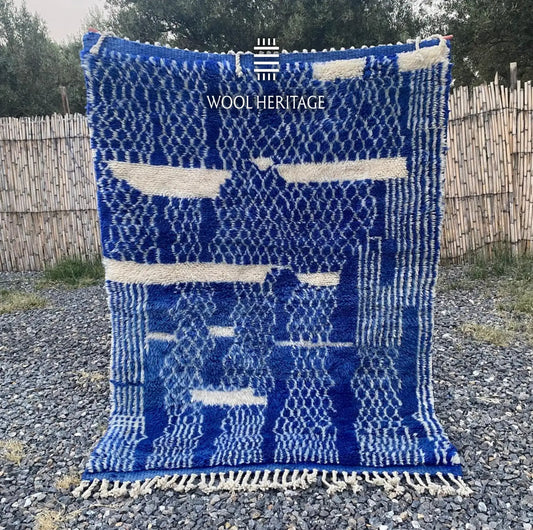 TARGA hand-knotted cobalt-blue and ivory Moroccan wool rug displayed outdoors in a full front view