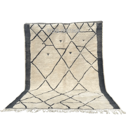 ADRAR ivory Beni Mrirt rug with charcoal mountain-like geometric lines and dark side borders in an isolated product view