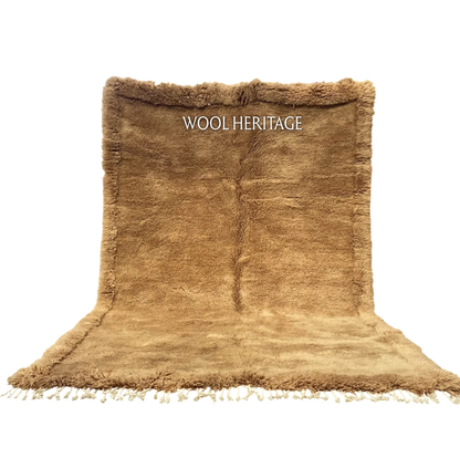 ASIREM camel Beni Mrirt rug with a raised border and flowing central line in an isolated product view
