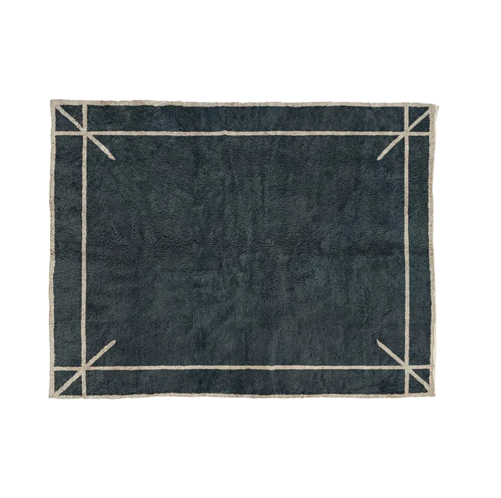 ASMA storm blue Beni Mrirt rug with a thin ivory border and marked corners, hand-knotted in M’rirt from Moroccan wool