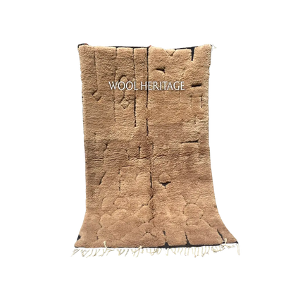 AZAGHAR camel-brown Beni Mrirt rug with irregular raised abstract forms in an isolated product view