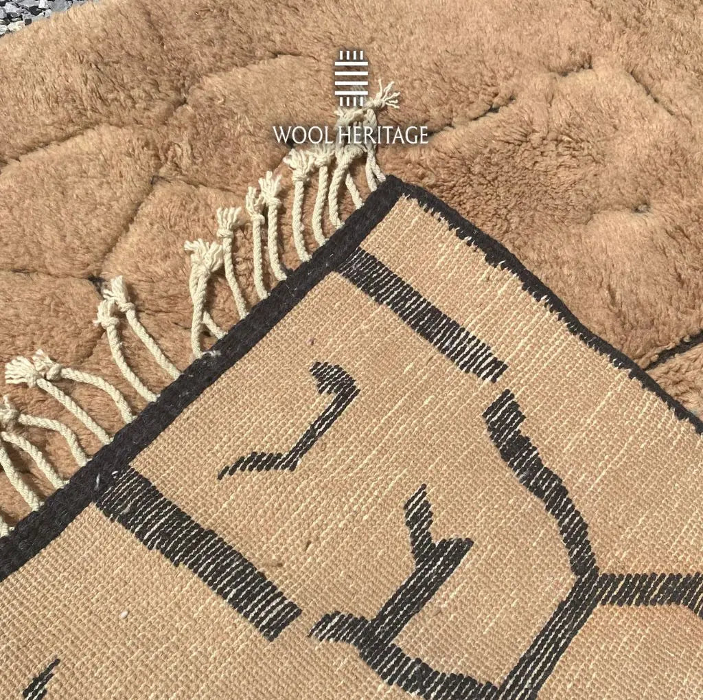 AZAGHAR rug close-up showing the finished edge, fringe, and woven backing