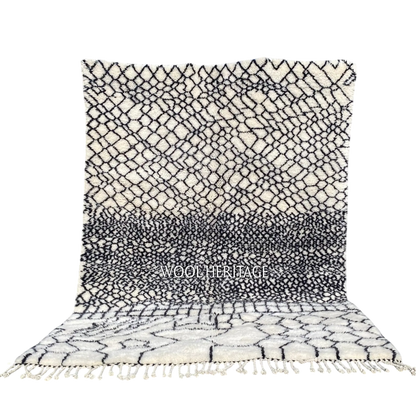 ITRAN black and ivory Beni Mrirt rug with an irregular diamond lattice in an isolated product view