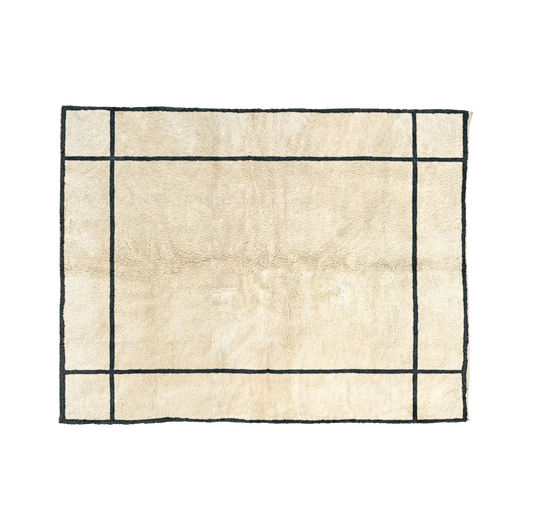 NAIMA natural wool Beni Mrirt rug with a hand-drawn black border, hand-knotted in M’rirt, Morocco