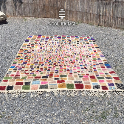 TAFSUT Beni Mrirt rug laid flat, showing its complete multicolour mosaic pattern across an ivory field
