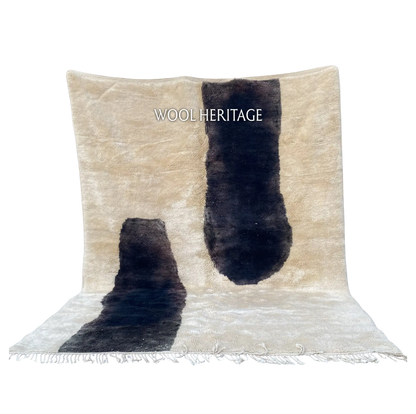 TAFUNAST black and ivory Beni Mrirt rug with two abstract cow-inspired forms in an isolated product view