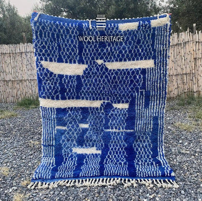 TARGA hand-knotted cobalt-blue and ivory Moroccan wool rug displayed outdoors in a full front view