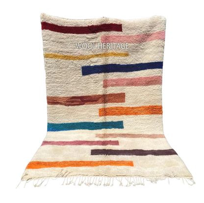 TIGRAT multicolour Beni Mrirt rug with uneven horizontal bands across an ivory wool ground in an isolated product view