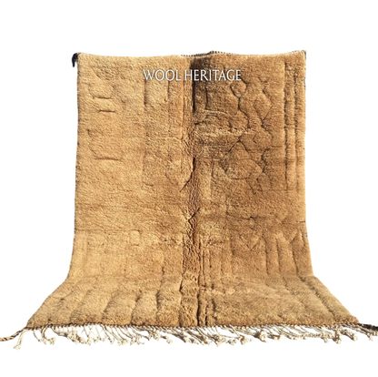 TIRRA golden-brown Beni Mrirt rug with sculpted abstract markings in an isolated product view