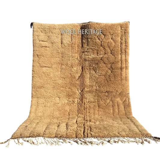TIRRA golden-brown Beni Mrirt rug with sculpted abstract markings in an isolated product view