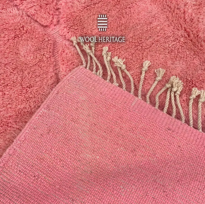 TISLIT rug close-up showing the woven backing, edge, and fringe
