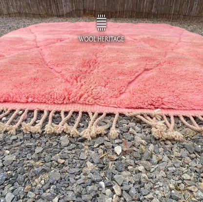 Close-up of TISLIT’s coral-pink pile and hand-finished fringe