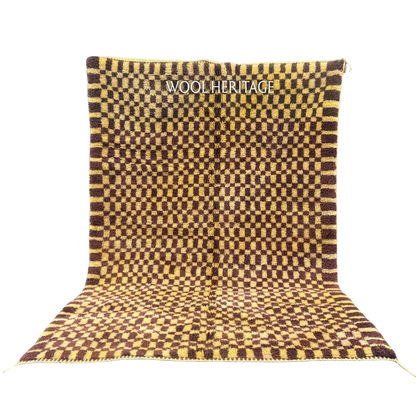 TIZWIT golden-yellow and brown Beni Mrirt rug with an irregular checkerboard in an isolated product view