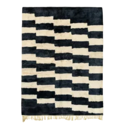Handmade black and white abstract Moroccan rug with stepped geometric pattern, crafted in natural wool by Berber artisans.