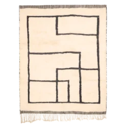 Handwoven abstract beige Moroccan rug with black line grid pattern, crafted in natural wool by Beni Mrirt artisans.