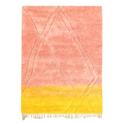 Pink and yellow rug with carved diamond motifs, handwoven in natural wool by Moroccan artisans.